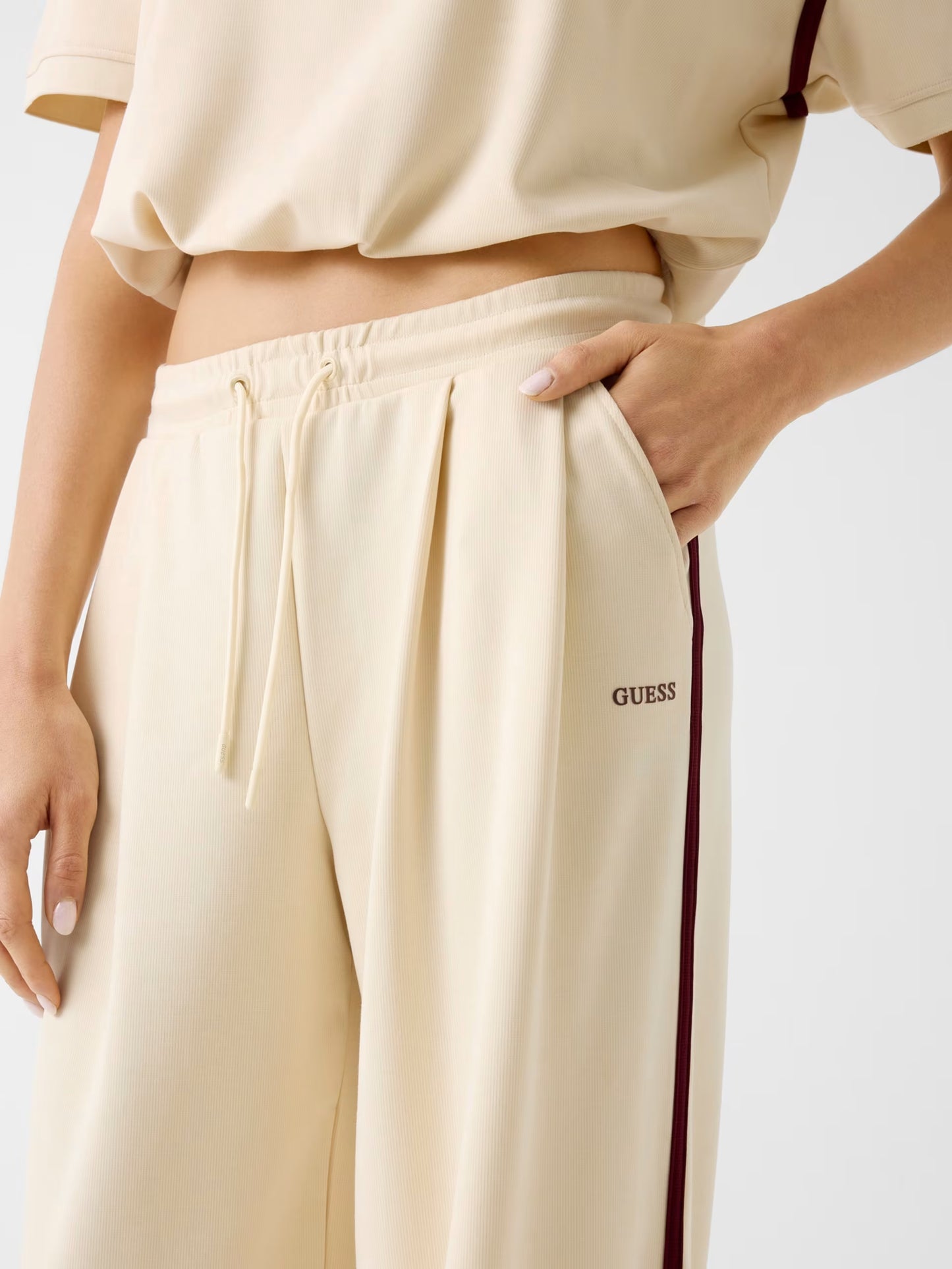 PANTALONI A GAMBA LARGA GUESS